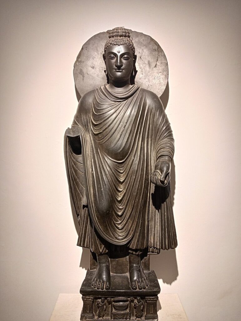Gandhara Standing Buddha, 1st century CE, Gandhara style, National Museum, Delhi.” https://commons.wikimedia.org/wiki/File:Gandhara_standing_Buddha.jpg