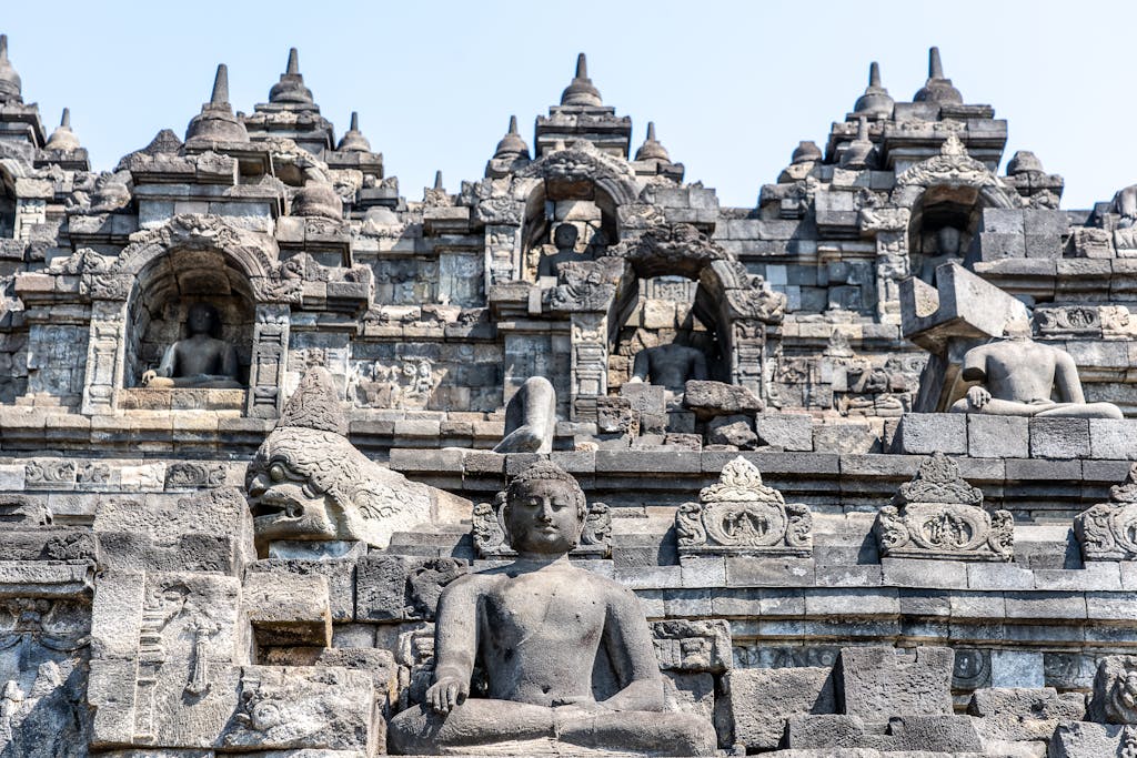 Close-up view of ancient stone sculptures and architecture at Borobudur Temple, Indonesia.
Buddhist cultures